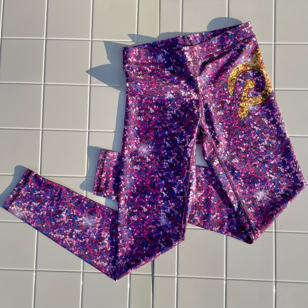 Peloton x Terez Purple and Gold Sequin Print Logo Leggings Size XS NWT Workout
